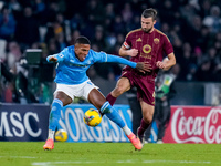 Michael Folorunsho of SSC Napoli and Bryan Cristante of AS Roma compete for the ball during the serie Serie A Enilive match between SSC Napo...