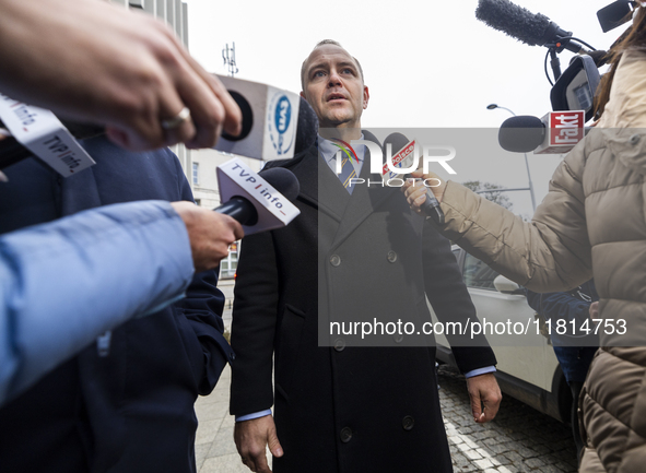 Karol Nawrocki, presidential candidate supported by the Law and Justice party in Poland's 2025 presidential election, meets with journalists...