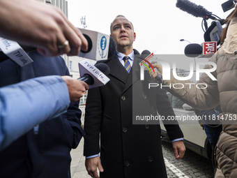 Karol Nawrocki, presidential candidate supported by the Law and Justice party in Poland's 2025 presidential election, meets with journalists...