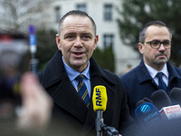 Karol Nawrocki (L) , presidential candidate supported by the Law and Justice party in Poland's 2025 presidential election, meets with journa...