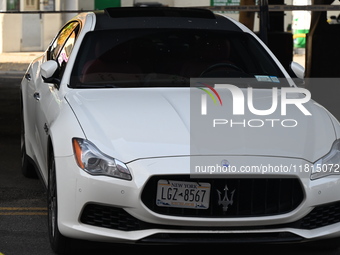 A 32-year-old man is shot multiple times while sitting in a Maserati at Park Avenue and 129th Street in Harlem, Manhattan, New York, United...