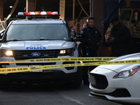 A 32-year-old man is shot multiple times while sitting in a Maserati at Park Avenue and 129th Street in Harlem, Manhattan, New York, United...