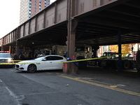 A 32-year-old man is shot multiple times while sitting in a Maserati at Park Avenue and 129th Street in Harlem, Manhattan, New York, United...