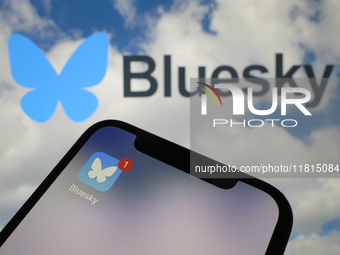 A close-up of the Bluesky social media app icon (