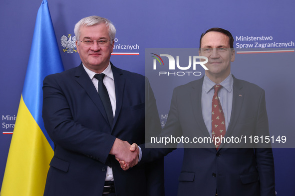 Radoslaw Sikorski, Minister of Foreign Affairs of Poland and  Andriy Sybiha, Minister of Foreign Affairs of Ukraine, shake hands during the...