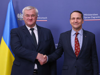 Radoslaw Sikorski, Minister of Foreign Affairs of Poland and  Andriy Sybiha, Minister of Foreign Affairs of Ukraine, shake hands during the...