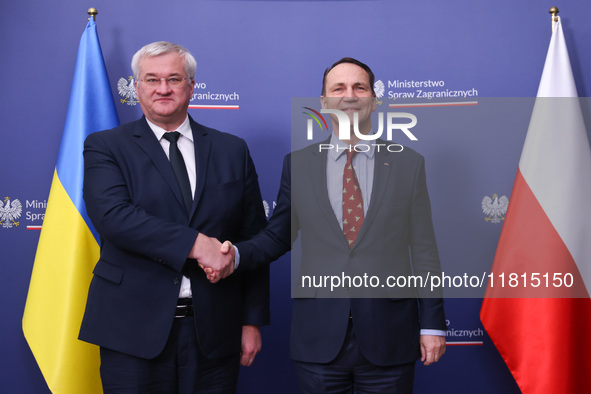 Radoslaw Sikorski, Minister of Foreign Affairs of Poland and  Andriy Sybiha, Minister of Foreign Affairs of Ukraine, shake hands during the...