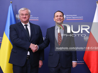 Radoslaw Sikorski, Minister of Foreign Affairs of Poland and  Andriy Sybiha, Minister of Foreign Affairs of Ukraine, shake hands during the...