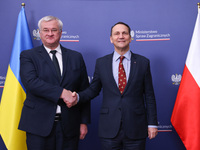 Radoslaw Sikorski, Minister of Foreign Affairs of Poland and  Andriy Sybiha, Minister of Foreign Affairs of Ukraine, shake hands during the...