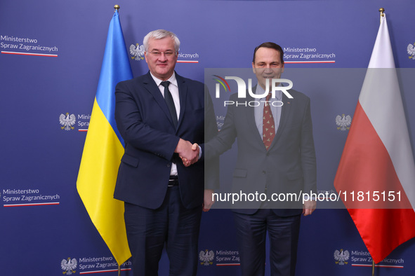 Radoslaw Sikorski, Minister of Foreign Affairs of Poland and  Andriy Sybiha, Minister of Foreign Affairs of Ukraine, shake hands during the...