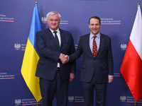 Radoslaw Sikorski, Minister of Foreign Affairs of Poland and  Andriy Sybiha, Minister of Foreign Affairs of Ukraine, shake hands during the...