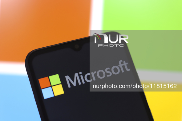 The Microsoft Corporation logo appears on the screen of a smartphone in Reno, United States, on November 27, 2024. (Photo Illustration by Ja...