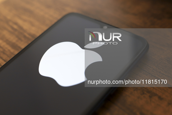 The Apple logo appears on the screen of a smartphone in Reno, United States, on November 27, 2024. (Photo Illustration by Jaque Silva/NurPho...