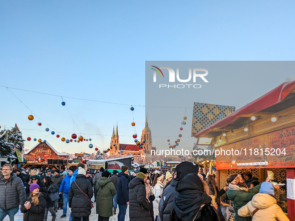 A snow-covered scene at the Winter Tollwood Festival on December 3, 2023, in Munich, Germany, shows the event's focus on art, culture, and s...