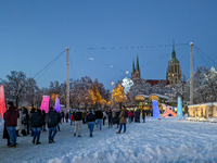 A snow-covered scene at the Winter Tollwood Festival on December 3, 2023, in Munich, Germany, shows the event's focus on art, culture, and s...