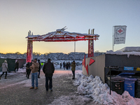 A snow-covered scene at the Winter Tollwood Festival on December 3, 2023, in Munich, Germany, shows the event's focus on art, culture, and s...