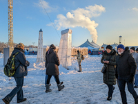 A snow-covered scene at the Winter Tollwood Festival on December 3, 2023, in Munich, Germany, shows the event's focus on art, culture, and s...