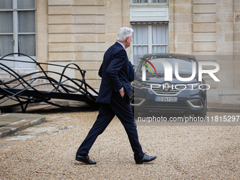 Michel Barnier, the French Prime Minister, is seen at the end of the council of the French ministers in the main courtyard of the Elysee Pal...