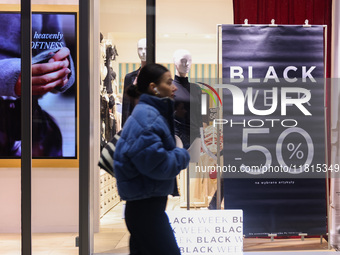 Black Week banner is seen in a shop window in Warsaw, Poland on N ovember 26th, 2024. (