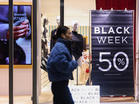 Black Week banner is seen in a shop window in Warsaw, Poland on N ovember 26th, 2024. (