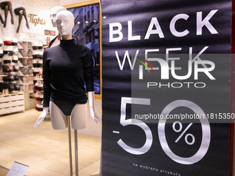 Black Week banner is seen in a shop window in Warsaw, Poland on N ovember 26th, 2024. (