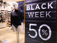 Black Week banner is seen in a shop window in Warsaw, Poland on N ovember 26th, 2024. (