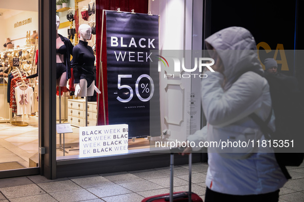 Black Week banner is seen in a shop window in Warsaw, Poland on N ovember 26th, 2024. 