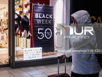 Black Week banner is seen in a shop window in Warsaw, Poland on N ovember 26th, 2024. (