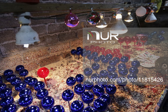 A view of balls in a workshop and copper mine where handcrafted balls made of blown glass are made for sale in the Tlahuac municipality, Mex...