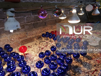 A view of balls in a workshop and copper mine where handcrafted balls made of blown glass are made for sale in the Tlahuac municipality, Mex...