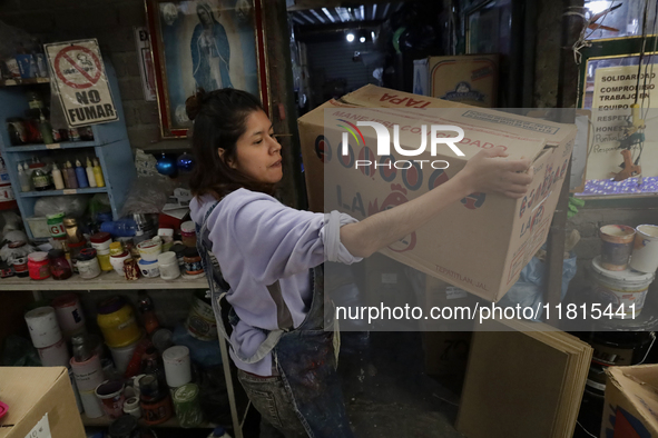 Handcrafted spheres made of blown glass are stored in a cooperative workshop for sale in the Tlahuac municipality, Mexico City, on Christmas...