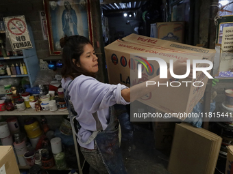 Handcrafted spheres made of blown glass are stored in a cooperative workshop for sale in the Tlahuac municipality, Mexico City, on Christmas...