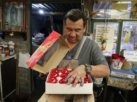 Handcrafted spheres made of blown glass are stored in a cooperative workshop for sale in the Tlahuac municipality, Mexico City, on Christmas...