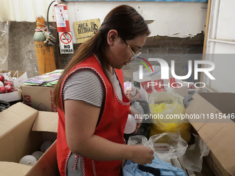 Handcrafted balls made of blown glass are screwed for sale in the Tlahuac municipality, Mexico City, on Christmas Eve and New Year in Mexico...