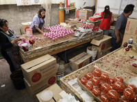 Inside a workshop and cooperative in the Tlahuac municipality, Mexico City, artisans make spheres from blown glass for sale on Christmas and...