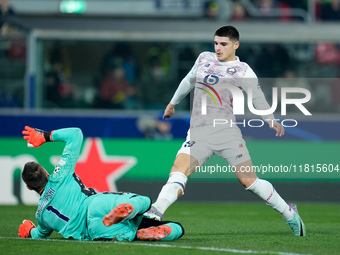 Lukasz Skorupski of Bologna FC saves on Matias Fernandez-Pardo of LOSC Lille during the UEFA Champions League 2024/25 League Phase MD5 match...