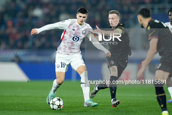 Matias Fernandez-Pardo of LOSC Lille and Lewis Ferguson of Bologna FC compete for the ball during the UEFA Champions League 2024/25 League P...