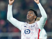 Jonathan David of LOSC Lille celebrates the victory during the UEFA Champions League 2024/25 League Phase MD5 match between Bologna FC and L...