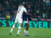 Ngal'ayel Mukau of LOSC Lille celebrates. the victory with Aissa Mandi of LOSC Lille during the UEFA Champions League 2024/25 League Phase M...