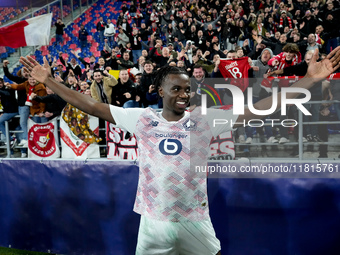 Ngal'ayel Mukau of LOSC Lille celebrates the victory posing with his supporters during the UEFA Champions League 2024/25 League Phase MD5 ma...