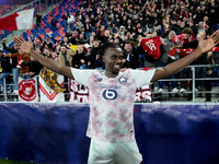 Ngal'ayel Mukau of LOSC Lille celebrates the victory posing with his supporters during the UEFA Champions League 2024/25 League Phase MD5 ma...