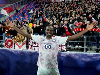 Ngal'ayel Mukau of LOSC Lille celebrates the victory posing with his supporters during the UEFA Champions League 2024/25 League Phase MD5 ma...