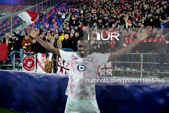 Ngal'ayel Mukau of LOSC Lille celebrates the victory posing with his supporters during the UEFA Champions League 2024/25 League Phase MD5 ma...