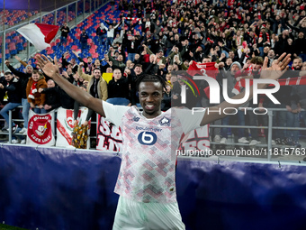 Ngal'ayel Mukau of LOSC Lille celebrates the victory posing with his supporters during the UEFA Champions League 2024/25 League Phase MD5 ma...