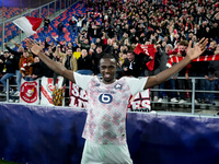 Ngal'ayel Mukau of LOSC Lille celebrates the victory posing with his supporters during the UEFA Champions League 2024/25 League Phase MD5 ma...