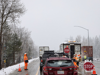 A winter storm brings chain control and delays on Interstate 80 East near Cisco Grove, Calif., on November 27, 2024. (