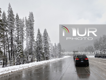 A winter storm brings chain control and delays on Interstate 80 East near Cisco Grove, Calif., on November 27, 2024. (