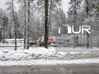 A winter storm brings chain control and delays on Interstate 80 East near Cisco Grove, Calif., on November 27, 2024. (