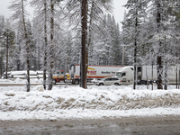 A winter storm brings chain control and delays on Interstate 80 East near Cisco Grove, Calif., on November 27, 2024. (