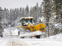 A winter storm brings chain control and delays on Interstate 80 East near Cisco Grove, Calif., on November 27, 2024. (